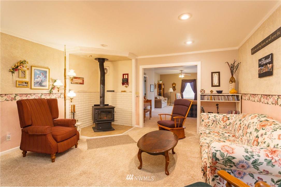 879 East Wiser Lake Road Lynden, WA 98264 - Photo 8 of 36 a living room with furniture and a table