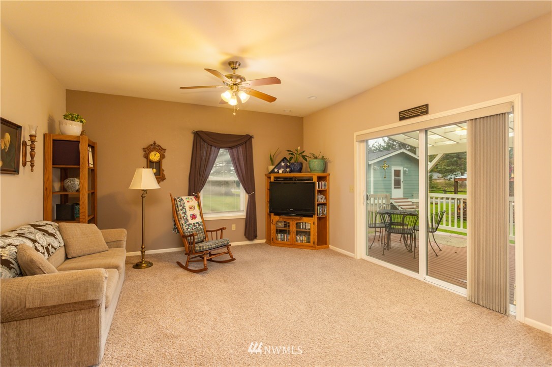 879 East Wiser Lake Road Lynden, WA 98264 - Photo 10 of 36 a view of a livingroom with furniture and a large window