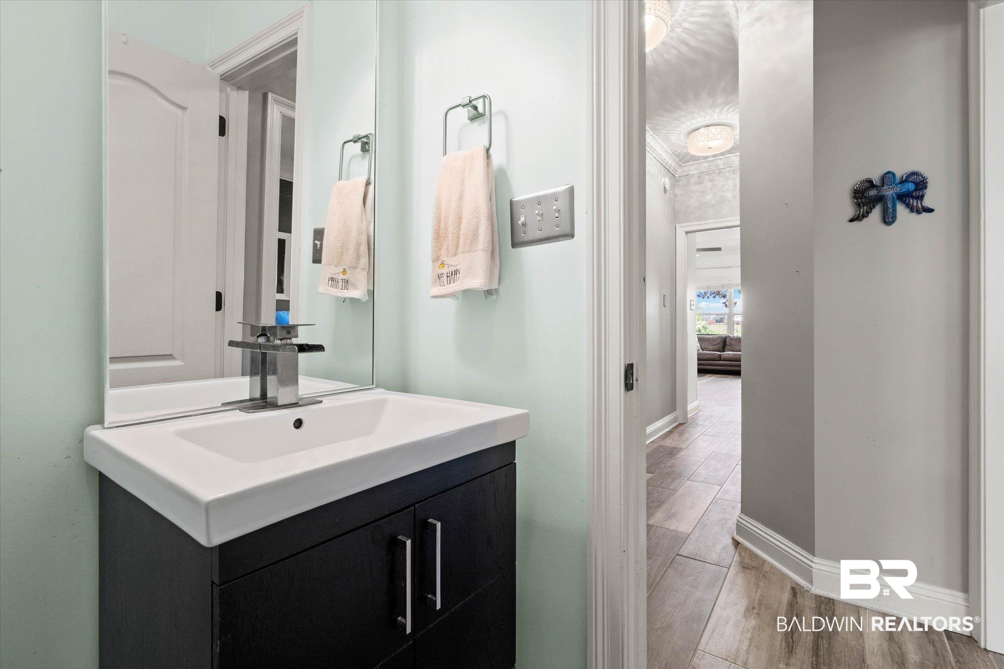 24908 Bosbyshell Avenue Daphne, AL 36526 - Photo 11 of 49 Bathroom vanity with a white rectangular basin and a chrome faucet