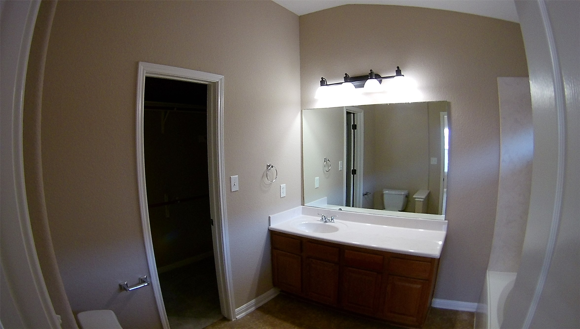 3304 Wickham Lane Austin, TX 78725 - Photo 6 of 13 a bathroom with a sink and a mirror