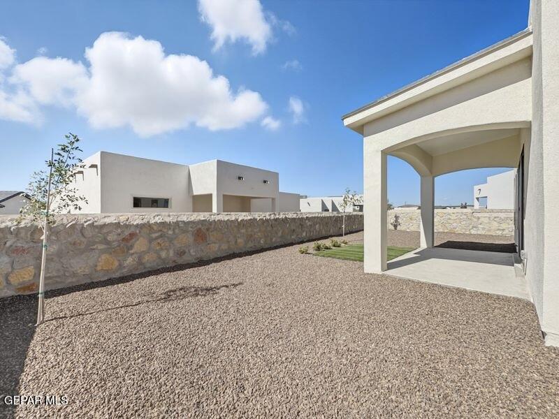 7248 Cimarron Rim Drive El Paso, TX 79911 - Photo 1 of 48 a view of a back yard of the house