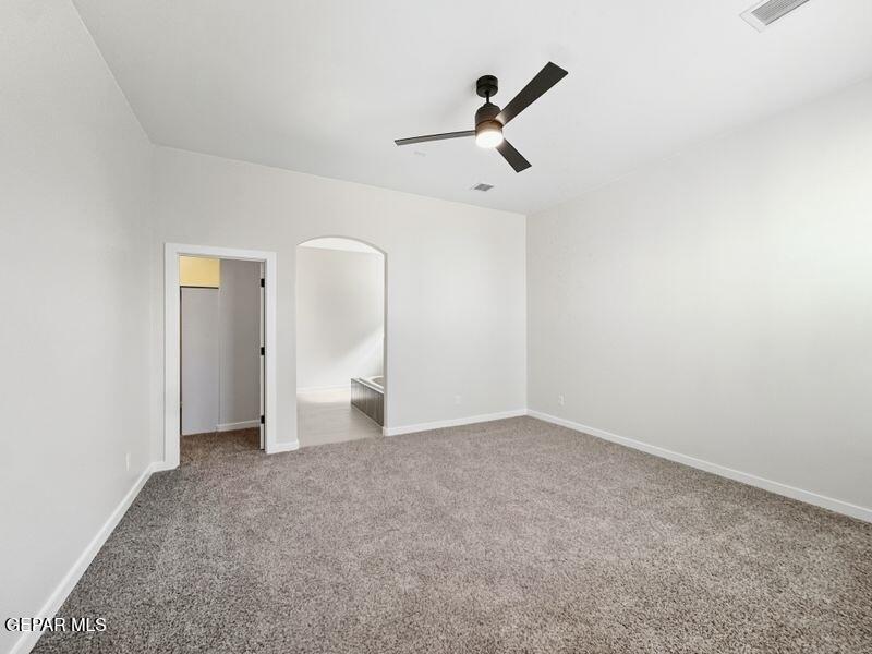 7248 Cimarron Rim Drive El Paso, TX 79911 - Photo 12 of 48 a view of empty room with windows