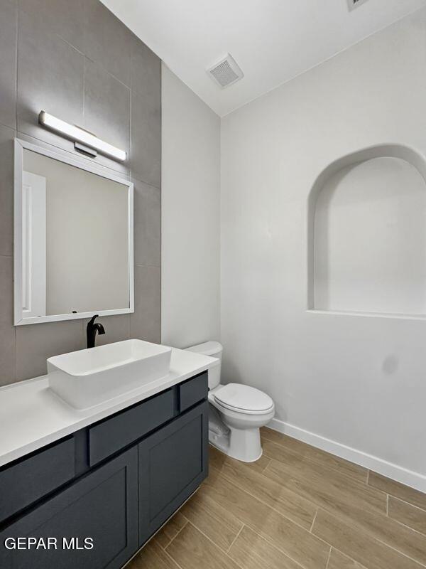 7248 Cimarron Rim Drive El Paso, TX 79911 - Photo 36 of 48 a bathroom with a sink and a mirror