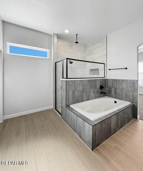 7248 Cimarron Rim Drive El Paso, TX 79911 - Photo 5 of 48 a white bath tub sitting in a bathroom