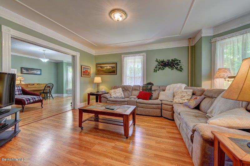 188 Huntington Road Worthington, MA 01098 - Photo 11 of 37 a living room with furniture and a wooden floor