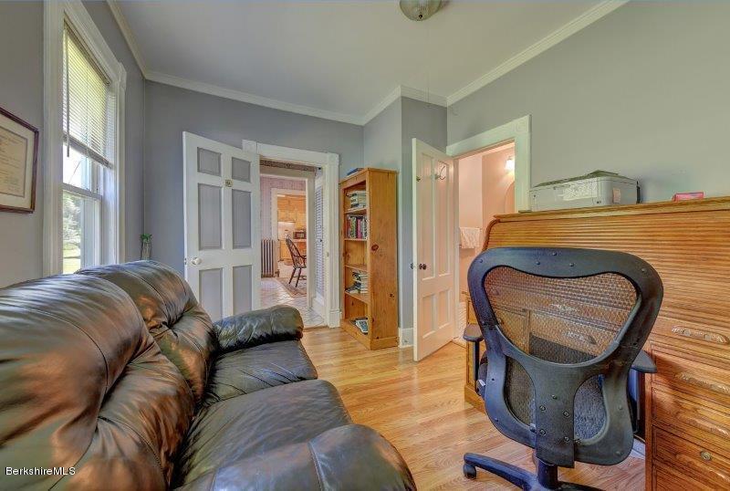 188 Huntington Road Worthington, MA 01098 - Photo 19 of 37 a living room with furniture and a window