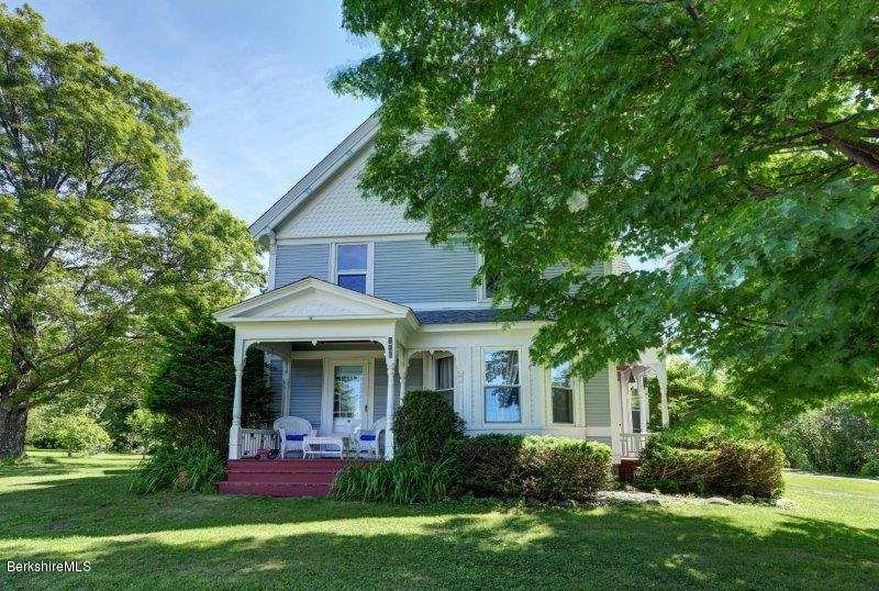 188 Huntington Road Worthington, MA 01098 - Photo 3 of 37 a front view of a house with garden