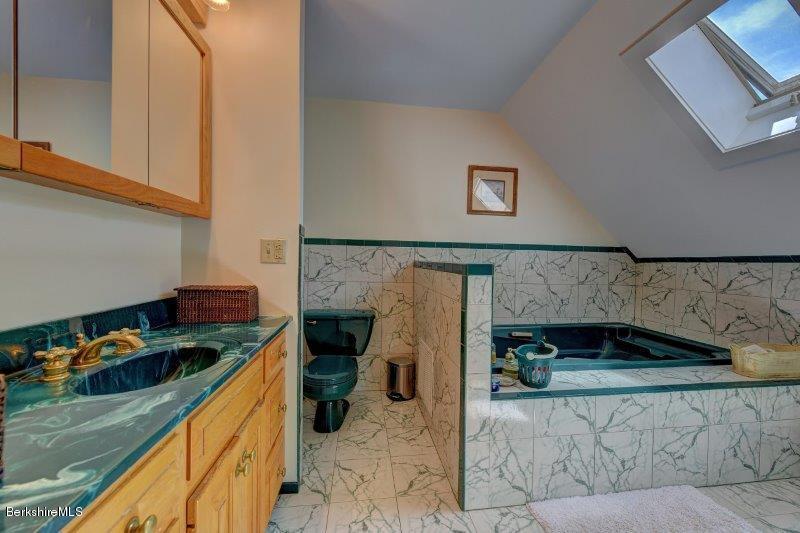 188 Huntington Road Worthington, MA 01098 - Photo 24 of 37 a kitchen with stainless steel appliances granite countertop a refrigerator and a stove