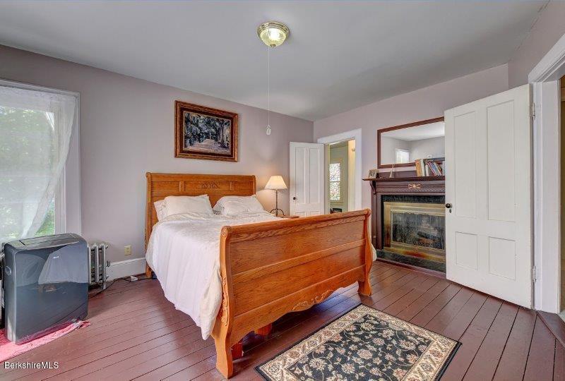 188 Huntington Road Worthington, MA 01098 - Photo 27 of 37 a bedroom with a bed and a dresser