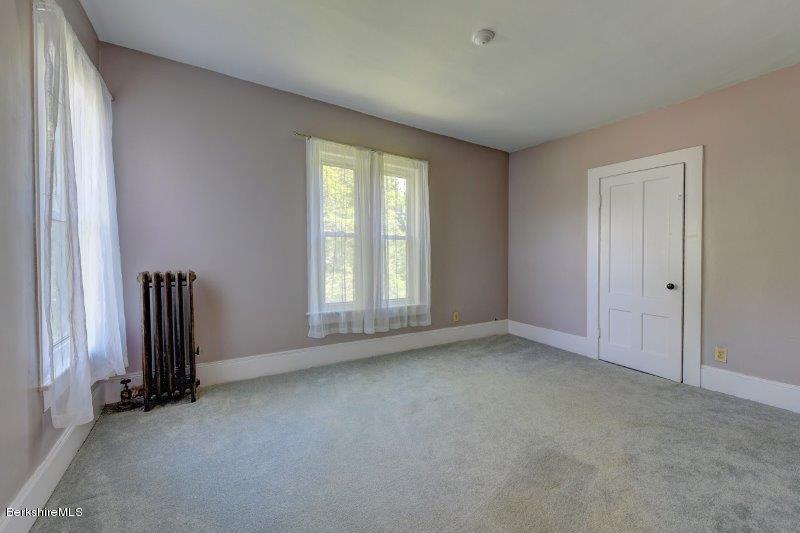 188 Huntington Road Worthington, MA 01098 - Photo 29 of 37 an empty room with a window