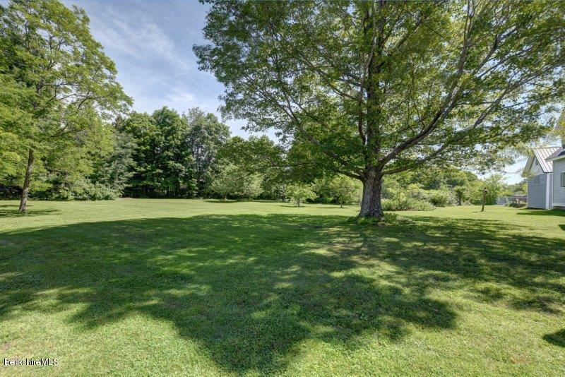 188 Huntington Road Worthington, MA 01098 - Photo 34 of 37 a view of green field with trees in the background