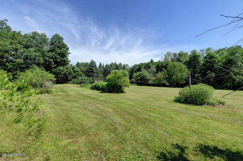 188 Huntington Road Worthington, MA 01098 - Photo 36 of 37 a view of a field of grass and trees