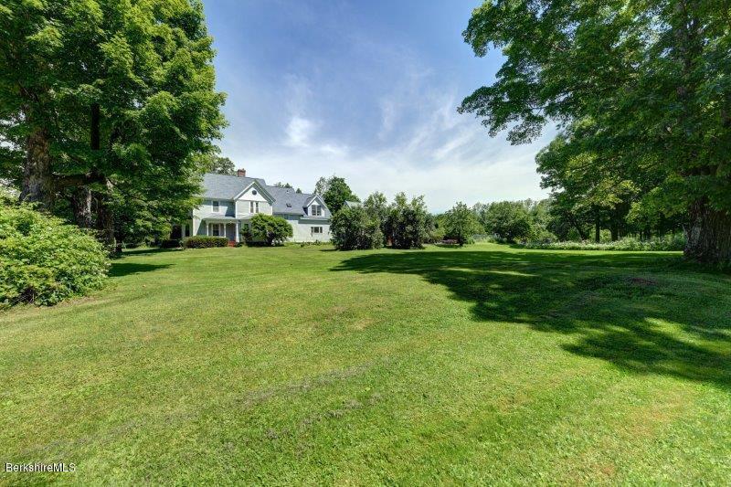 188 Huntington Road Worthington, MA 01098 - Photo 8 of 37 a view of a grassy field with trees