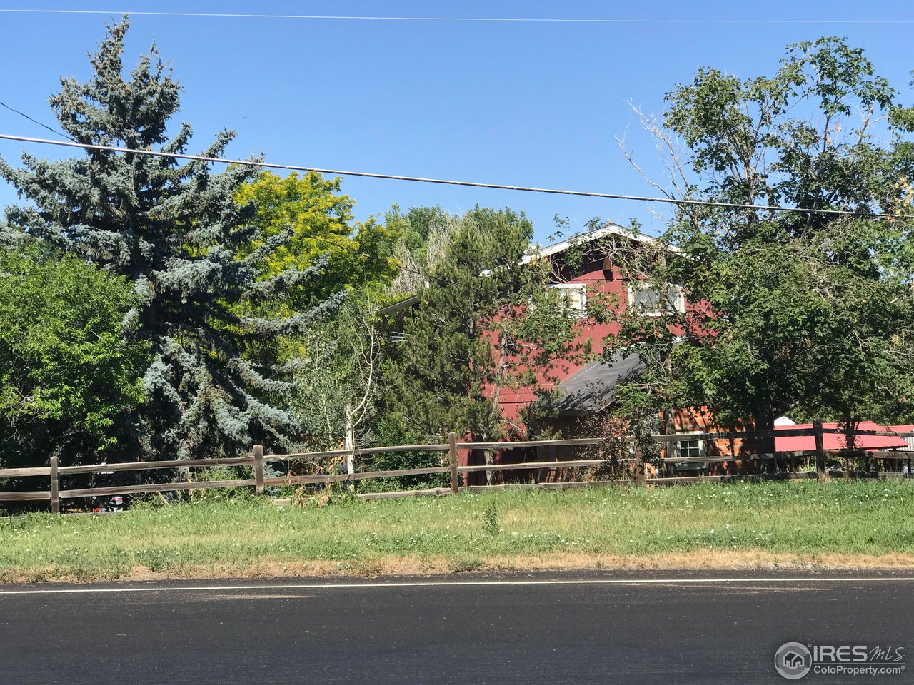 7450 Valmont Road Boulder, CO 80301 - Photo 1 of 10 a backyard of a house with lots of green space
