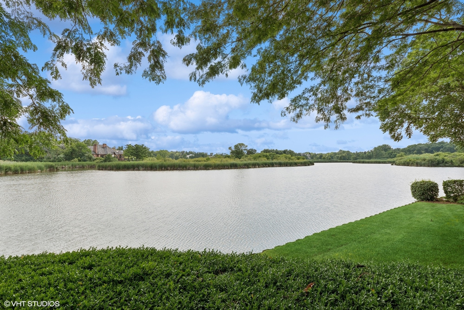 31 Riderwood Road North Barrington, IL 60010 - Photo 31 of 35 a view of a lake with houses in the back