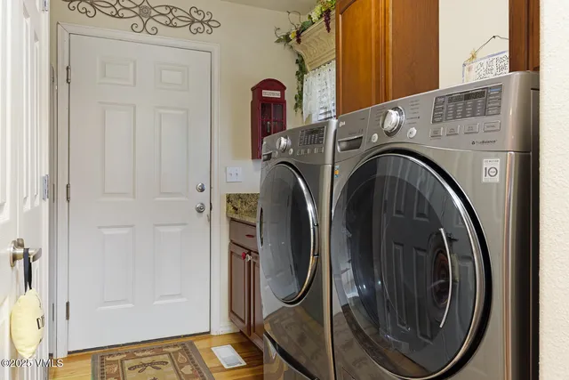 a utility room with dryer and washer