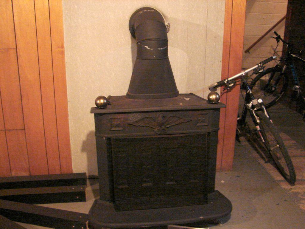 11 Ridge Road York, ME 03909 - Photo 9 of 11 Wood stove in basement to help with...