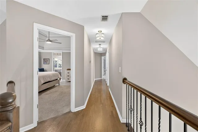 a bedroom with a bed couch and window