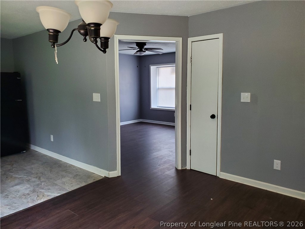 724 Spruce Street Lumberton, NC 28358 - Photo 6 of 13 wooden floor in an empty room