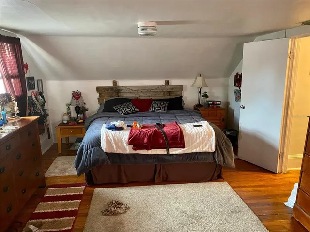 a bathroom with a sink toilet and mirror