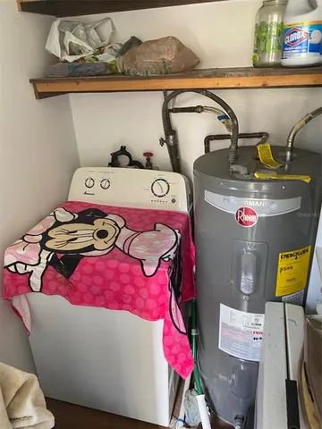 a kitchen with stainless steel appliances a stove a sink and a refrigerator
