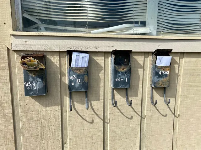 a view of a dining room and livingroom with furniture