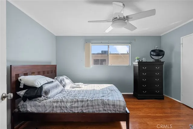 a bedroom with a bed and a cabinets