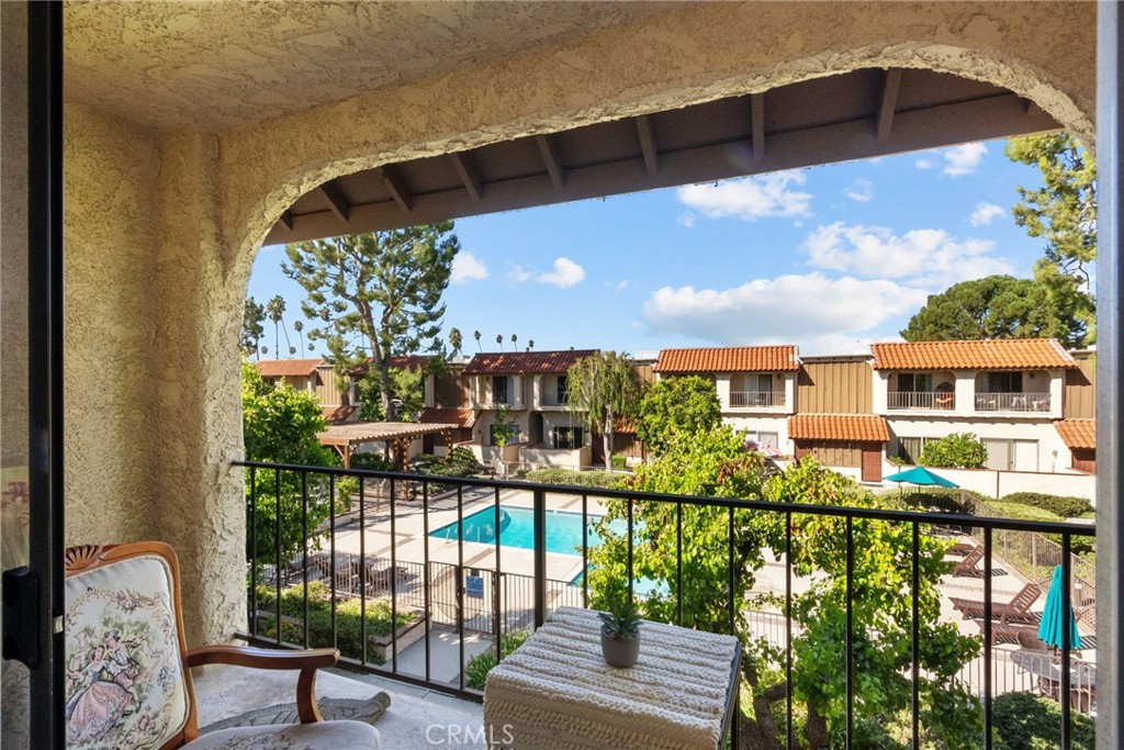 19545 Sherman Way, Unit 74 Reseda, CA 91335 - Photo 19 of 26 a view of a balcony with an outdoor seating