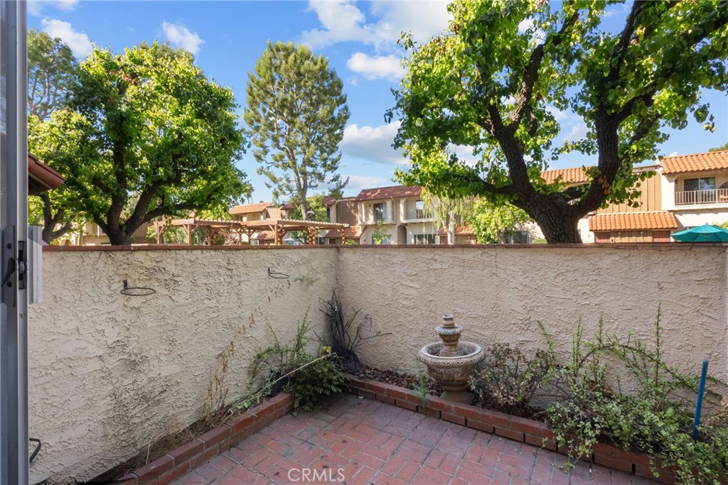 19545 Sherman Way, Unit 74 Reseda, CA 91335 - Photo 22 of 26 an aerial view of a house with outdoor space