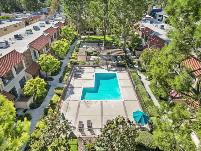 a view of swimming pool with a patio