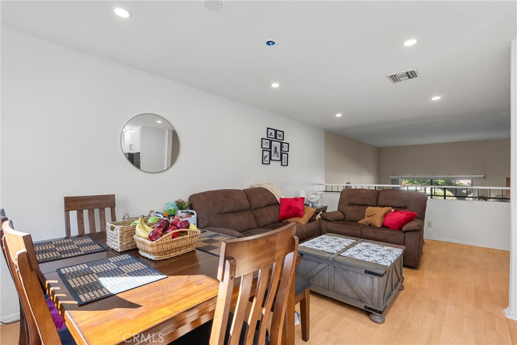 19545 Sherman Way, Unit 74 Reseda, CA 91335 - Photo 10 of 26 a living room with furniture and a flat screen tv
