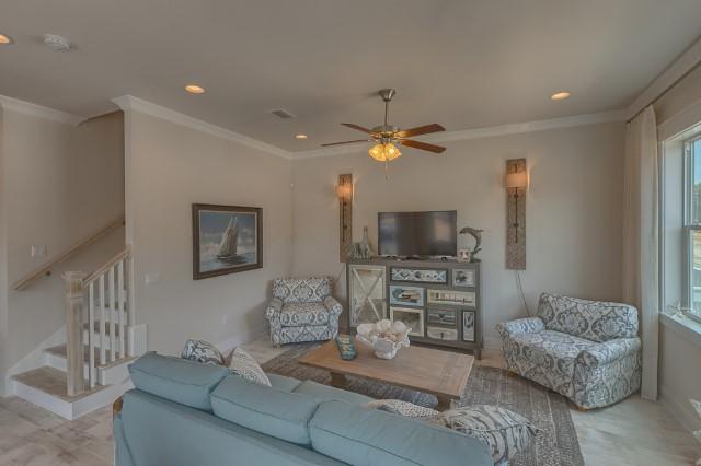54 Pine Lands Loop Ln Inlet Beach West, Unit B Inlet Beach, FL 32461 - Photo 24 of 35 a living room with furniture and a flat screen tv