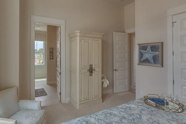 54 Pine Lands Loop Ln Inlet Beach West, Unit B Inlet Beach, FL 32461 - Photo 32 of 35 a bathroom with a tub and shower