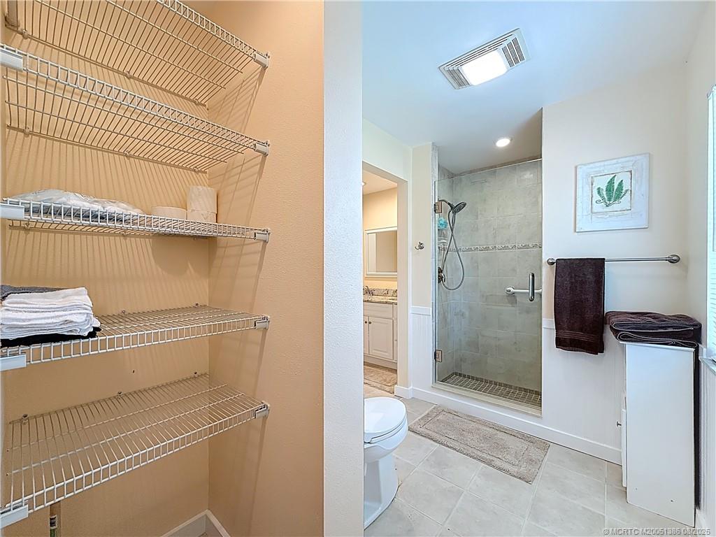 2082 Southeast Pyramid Road Port St. Lucie, FL 34952 - Photo 45 of 87 LARGE SHOWE AND DOUBLE SINK, LG LINEN CLOSET , TILE FLOORS