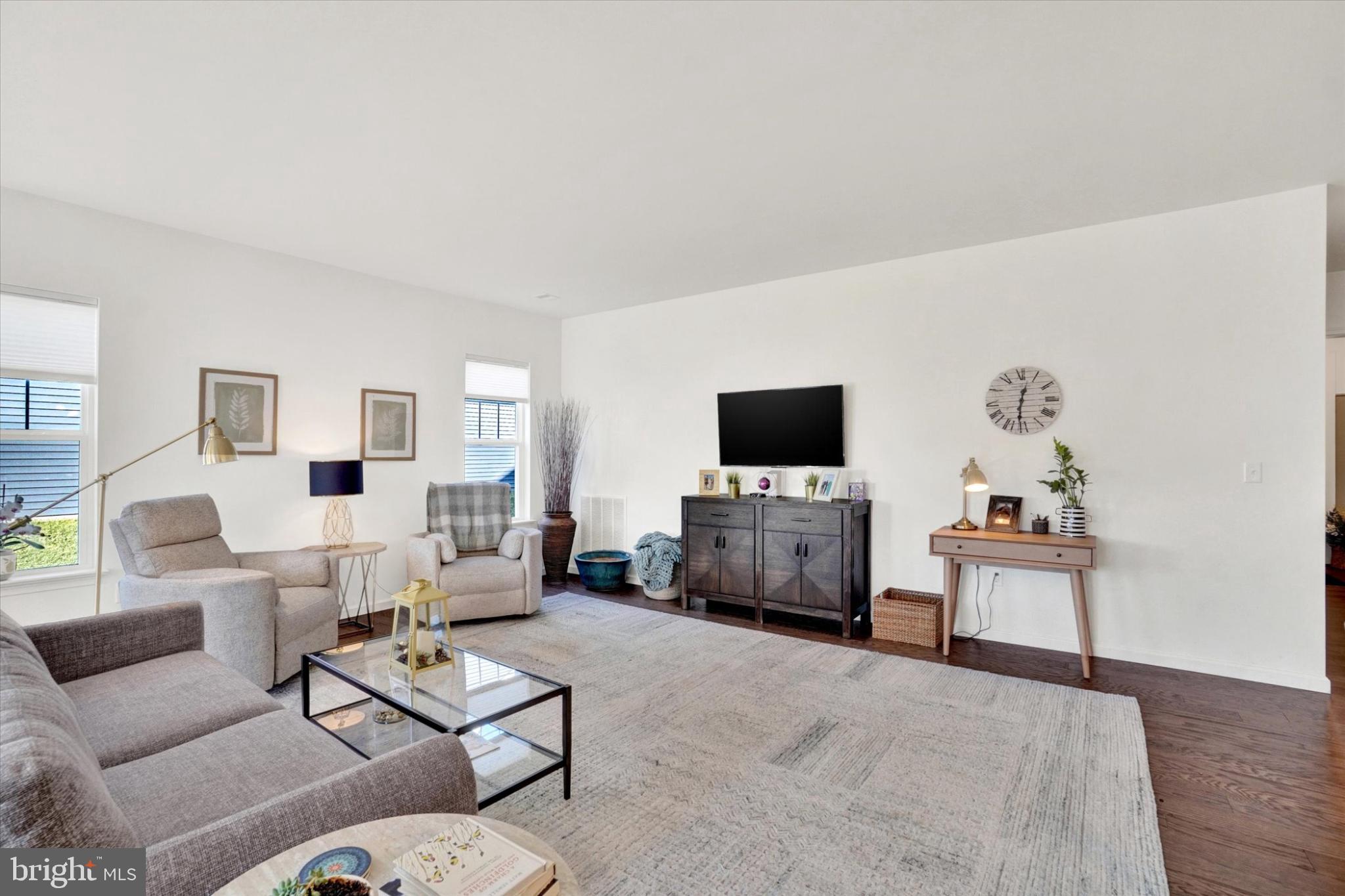 922 Shadowbrooke Dover, PA 17315 - Photo 11 of 25 a living room with furniture and a flat screen tv