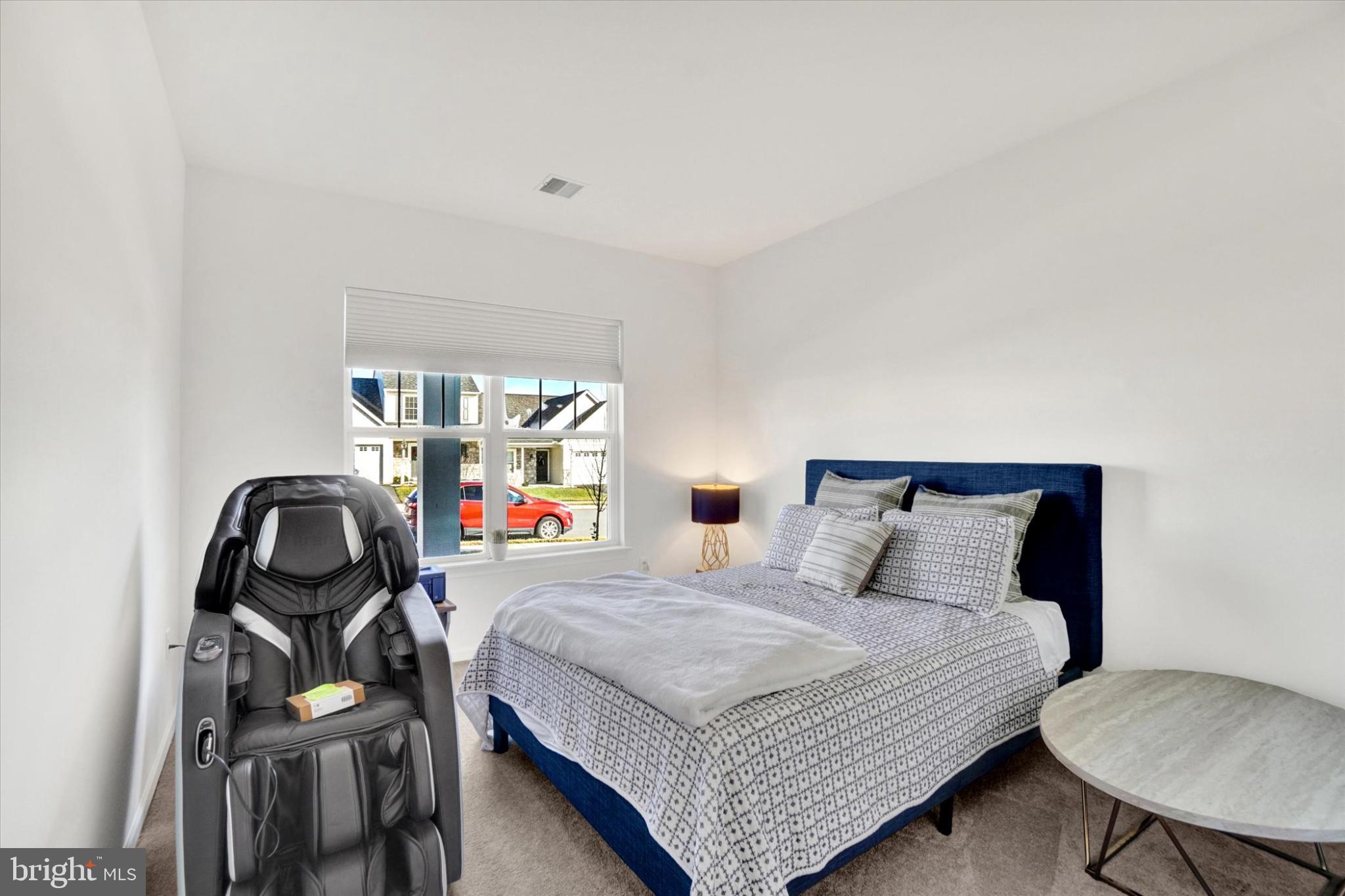 922 Shadowbrooke Dover, PA 17315 - Photo 15 of 25 a bedroom with a bed and a desk