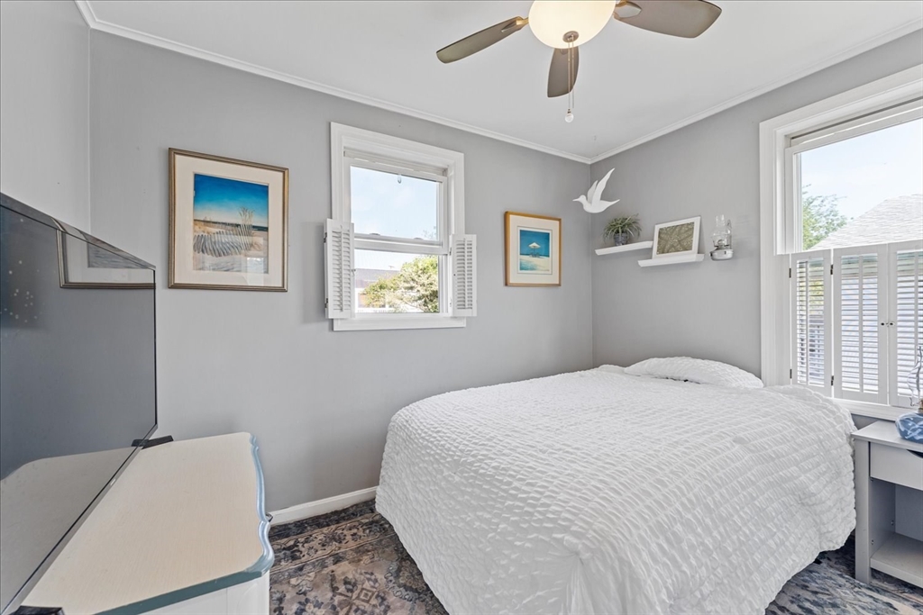 45 Tupelo Road South Kingstown, RI 02879 - Photo 13 of 28 a bedroom with a bed and a window