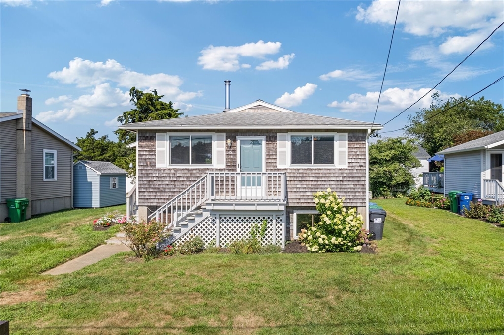 45 Tupelo Road South Kingstown, RI 02879 - Photo 2 of 28 a front view of a house with a yard