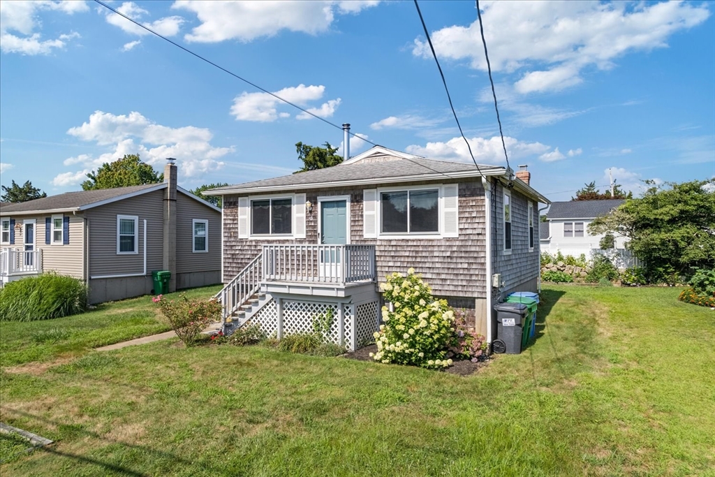 45 Tupelo Road South Kingstown, RI 02879 - Photo 4 of 28 a front view of a house with a yard