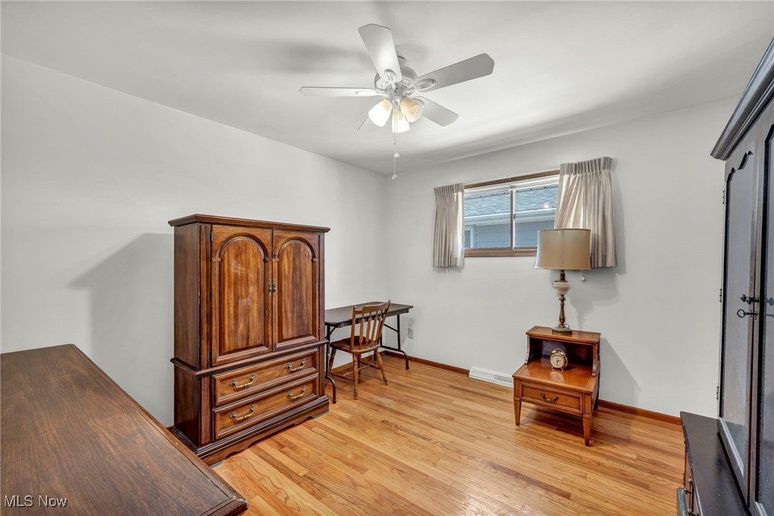 13732 Carpenter Road Garfield Heights, OH 44125 - Photo 17 of 46 Office space featuring light wood-style floors and a ceiling fan