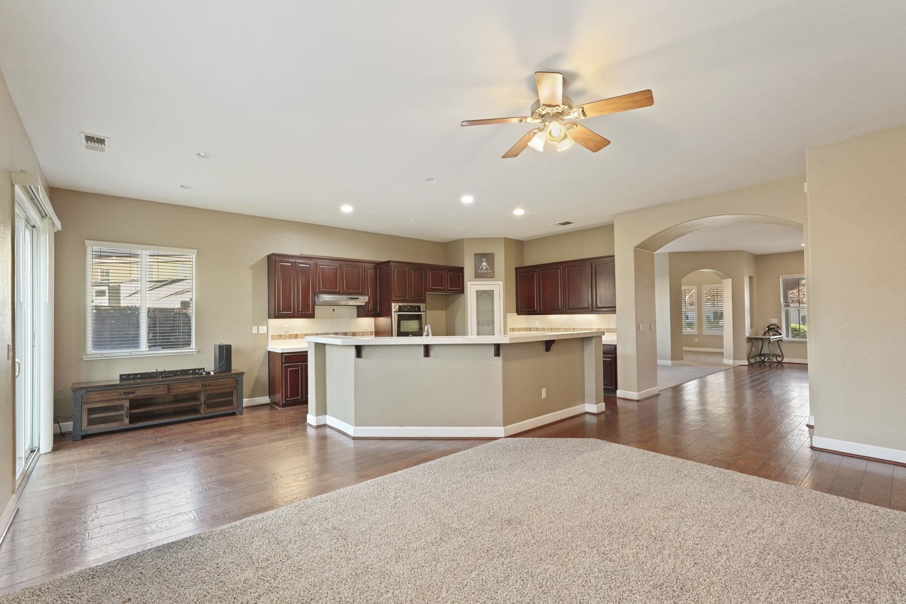 2644 Swainsons Hawk Street Stockton, CA 95209 - Photo 14 of 41 a view of a living room kitchen and a window