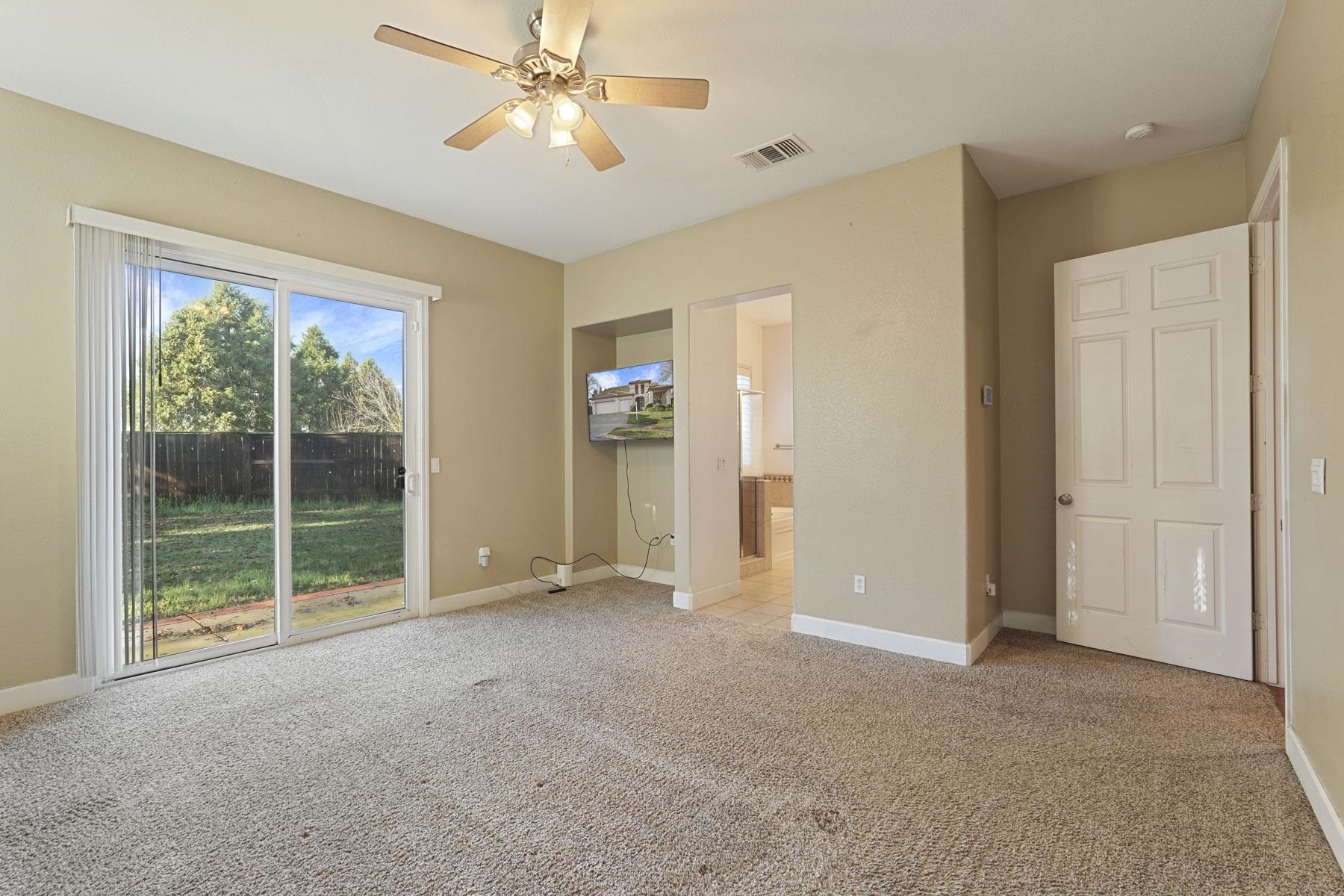 2644 Swainsons Hawk Street Stockton, CA 95209 - Photo 20 of 41 a view of empty room with window and ceiling fan
