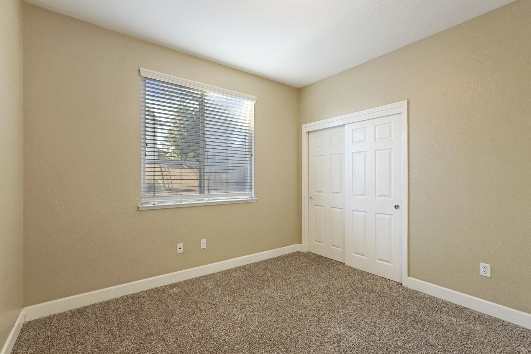 2644 Swainsons Hawk Street Stockton, CA 95209 - Photo 26 of 41 a view of an empty room with a window