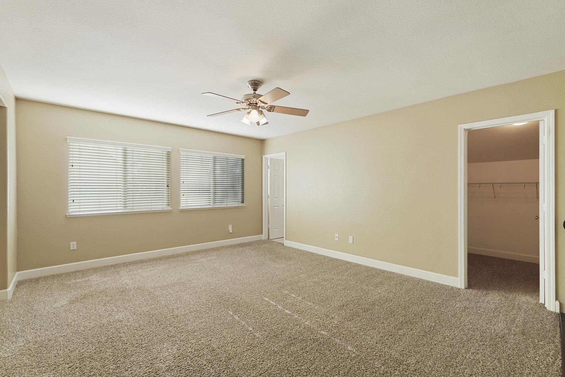 2644 Swainsons Hawk Street Stockton, CA 95209 - Photo 30 of 41 a view of an empty room with a window