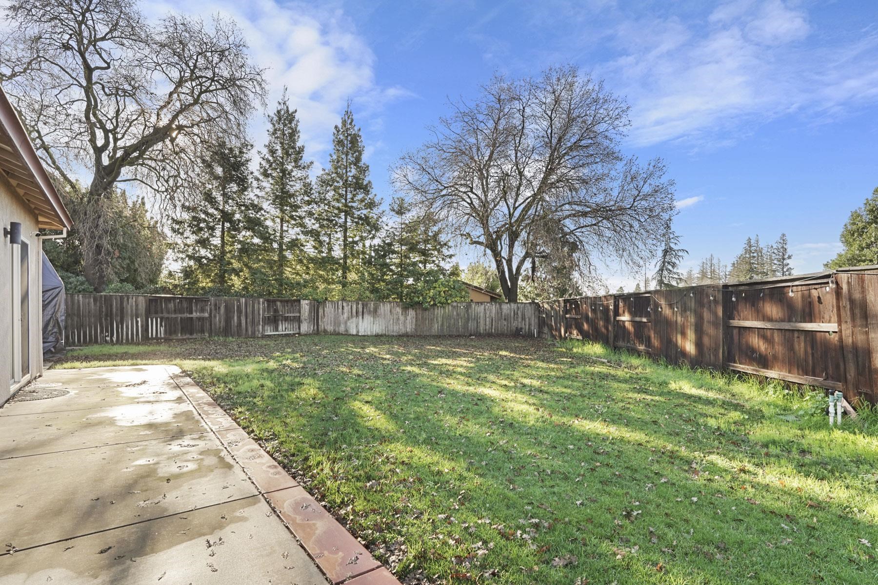 2644 Swainsons Hawk Street Stockton, CA 95209 - Photo 38 of 41 a view of backyard with wooden fence