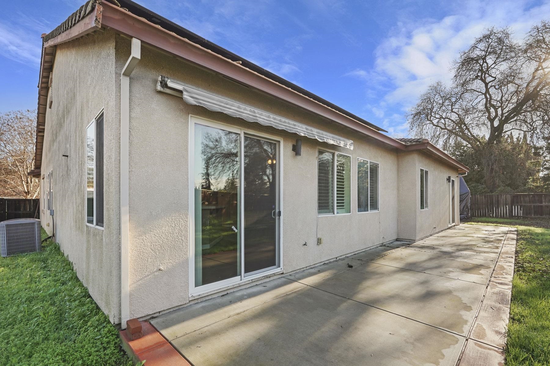 2644 Swainsons Hawk Street Stockton, CA 95209 - Photo 39 of 41 a front view of a house with a yard