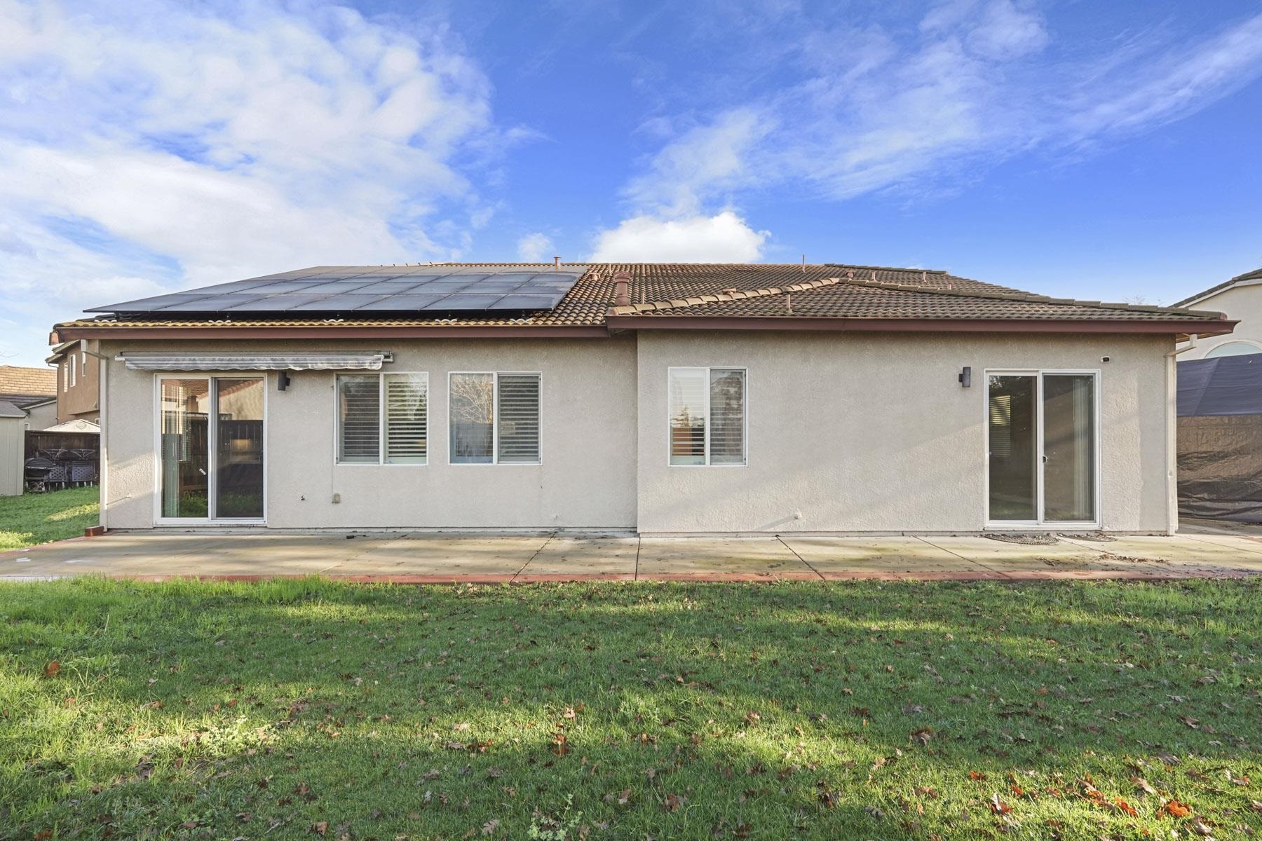 2644 Swainsons Hawk Street Stockton, CA 95209 - Photo 41 of 41 a house view with a garden space