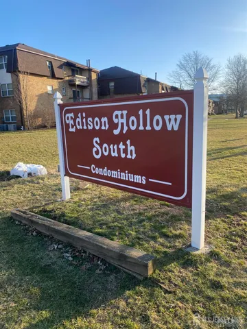 a sign on the side of the road