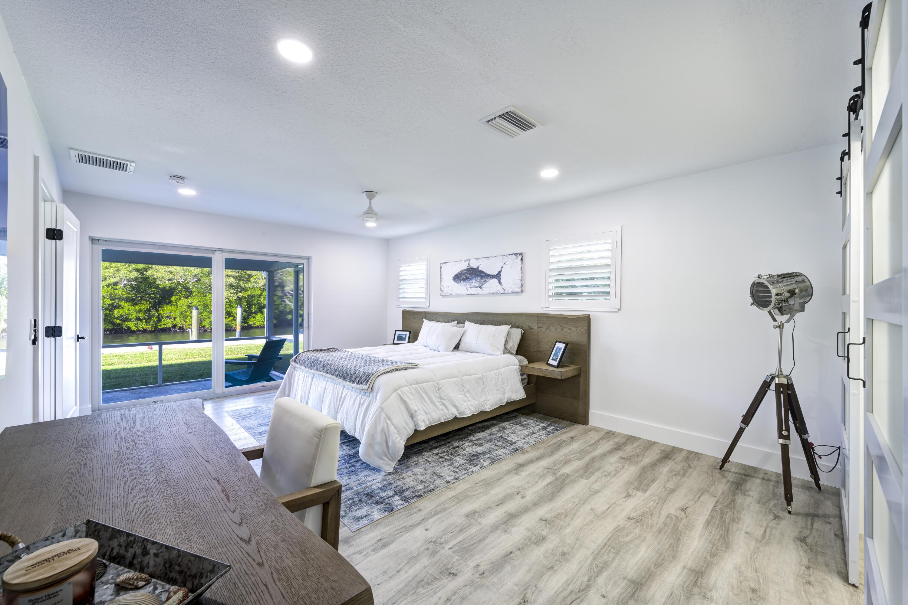 8585 Southeast Palm Street Hobe Sound, FL 33455 - Photo 18 of 43 Primary Bedroom