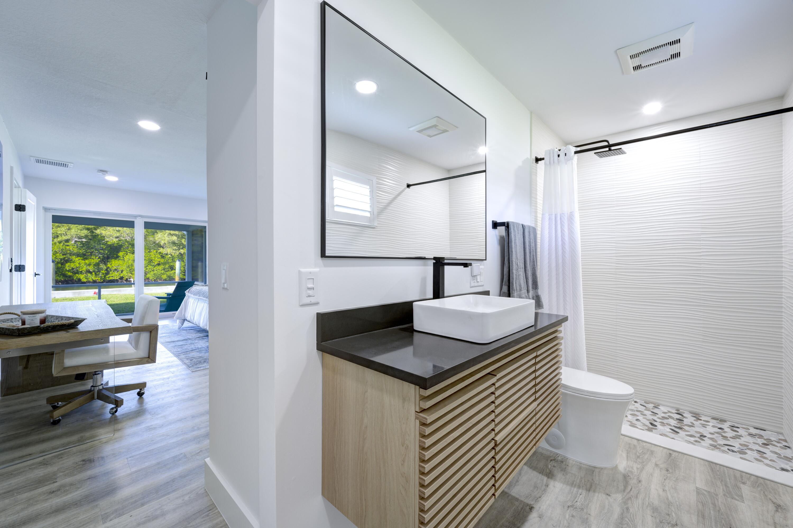 8585 Southeast Palm Street Hobe Sound, FL 33455 - Photo 19 of 43 Primary Bath